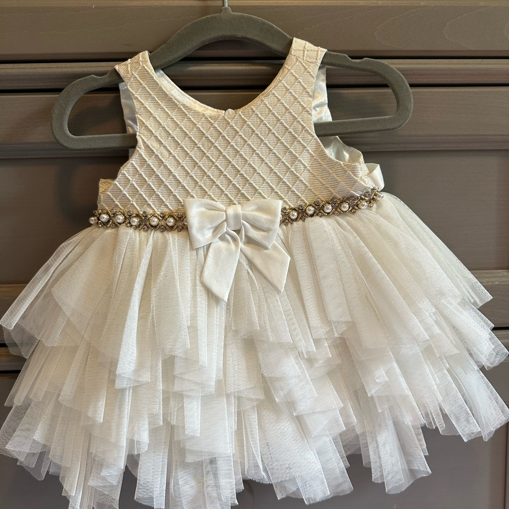 Elegant White and Gold detail Baby Dress with Bow with ornate details